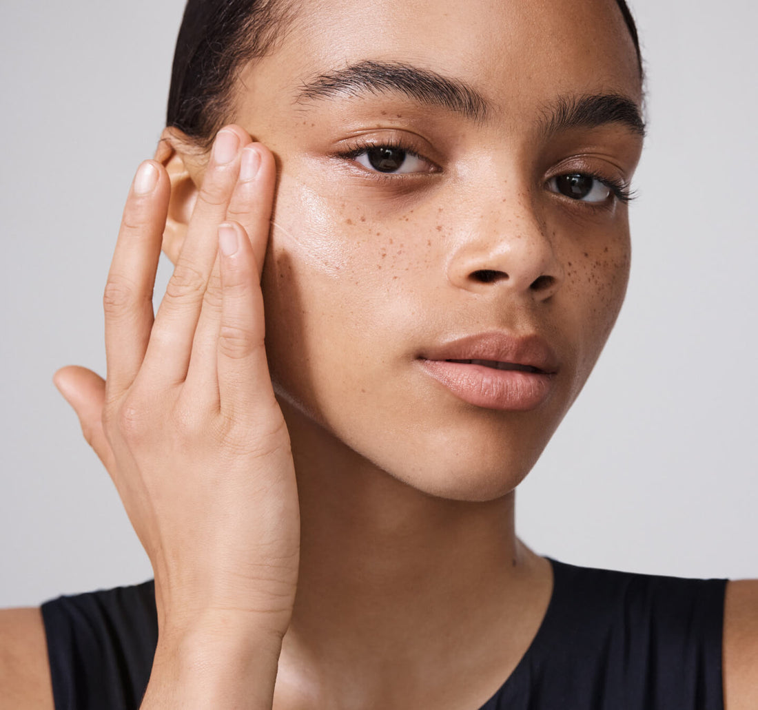 To Save Face SPF50+ model applying